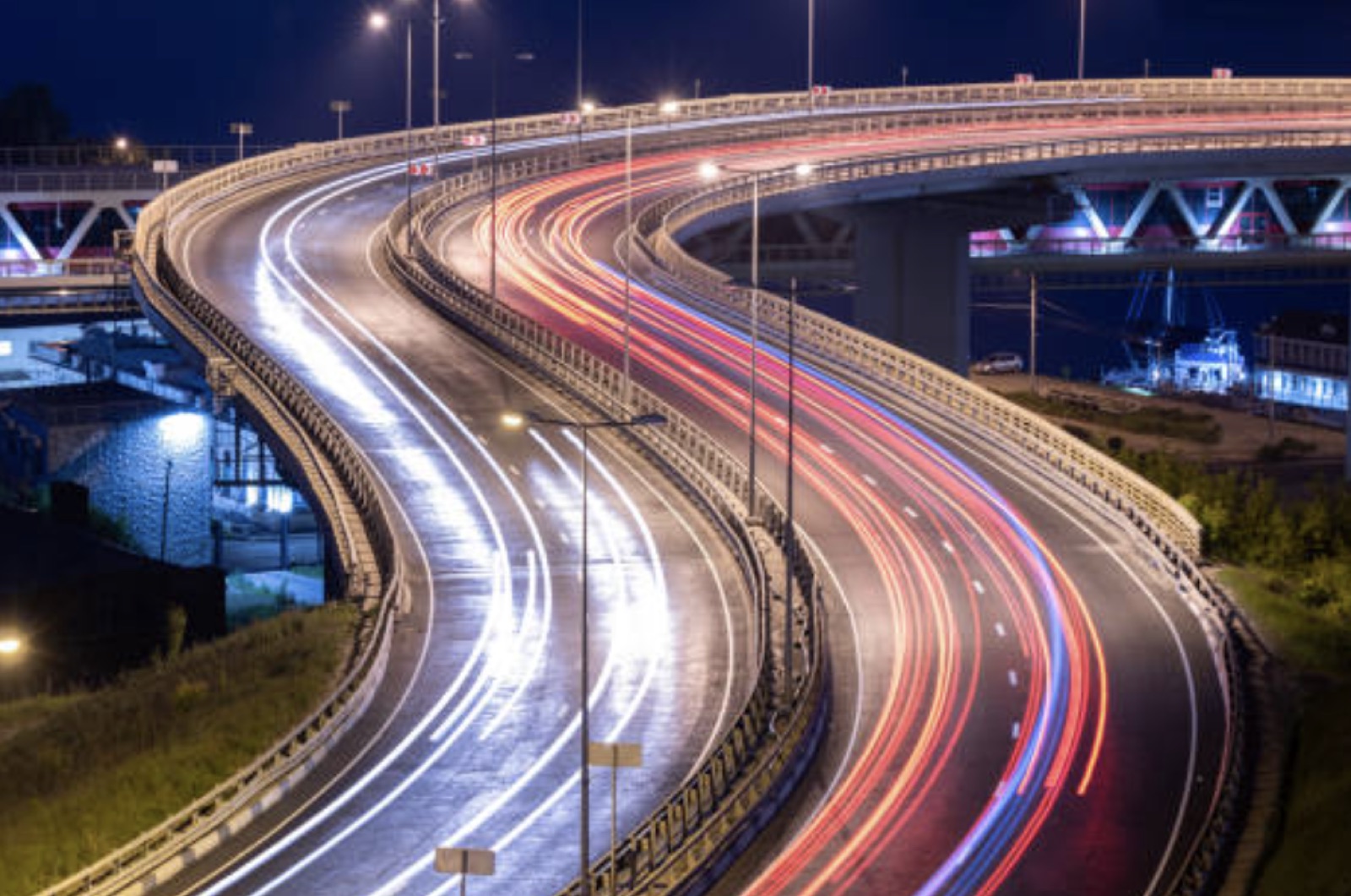 Night traffic light trails on an Indian flyover — the low-light driving DashMan is tuned for